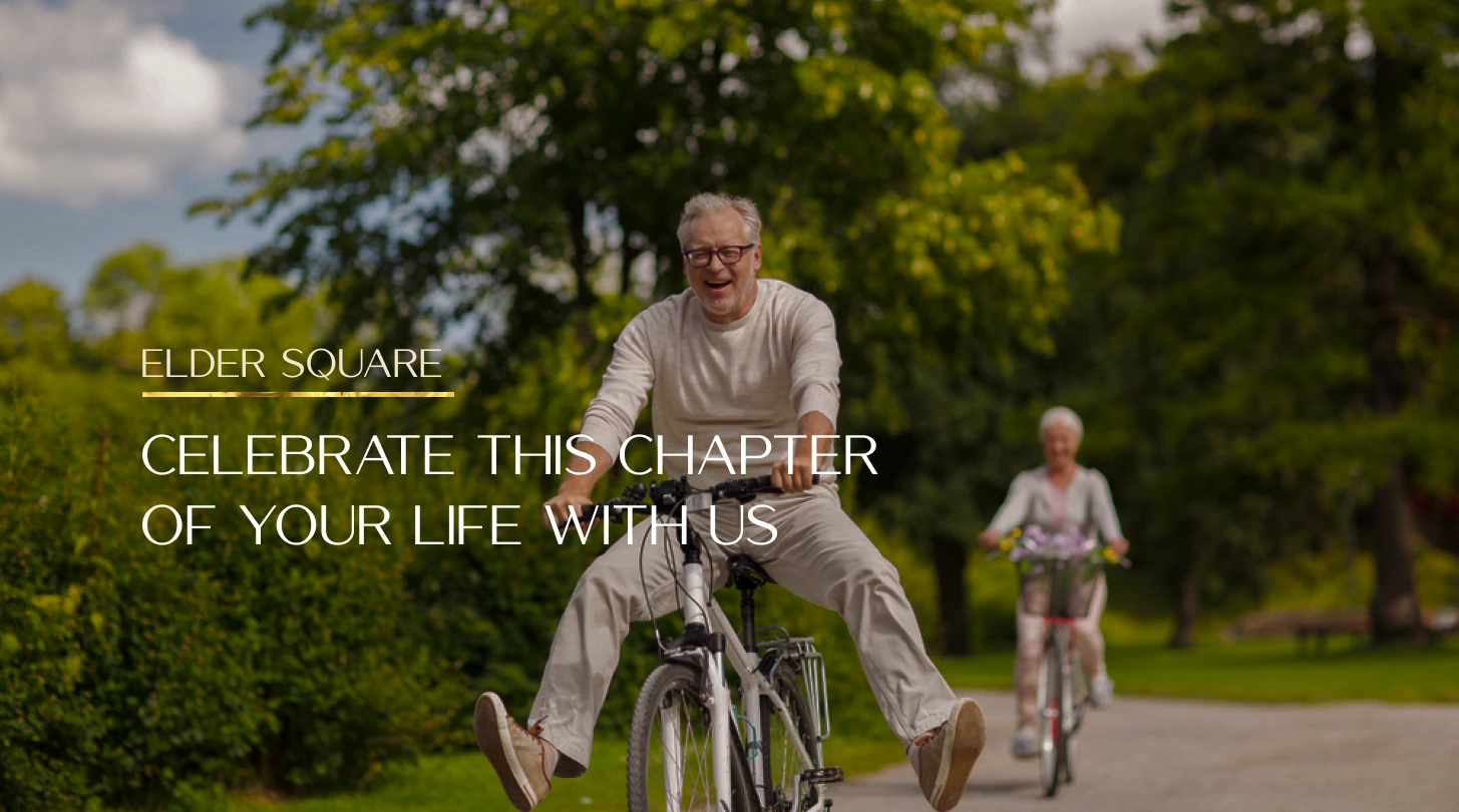Seniors cycling together through a leafy park