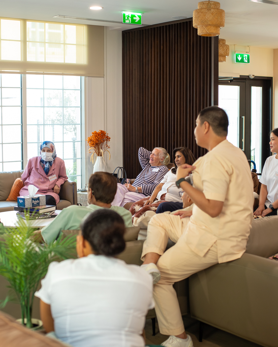 Guests chatting over drinks at The Square Café